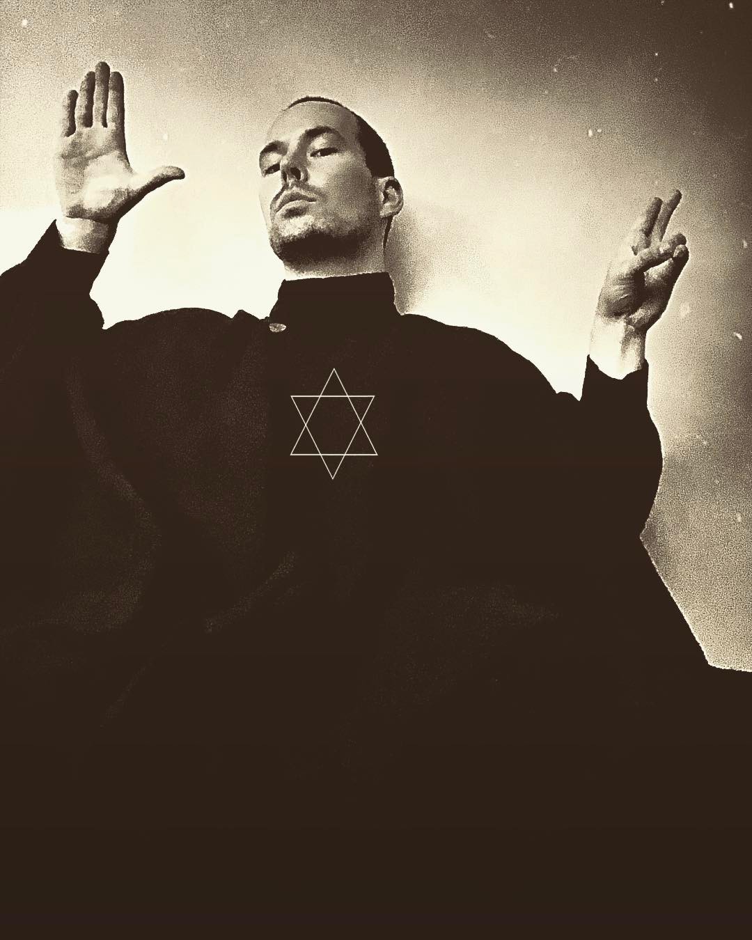 Frater Ifpas - on Instagram "this_occult_life" in black altar robe with hexagram